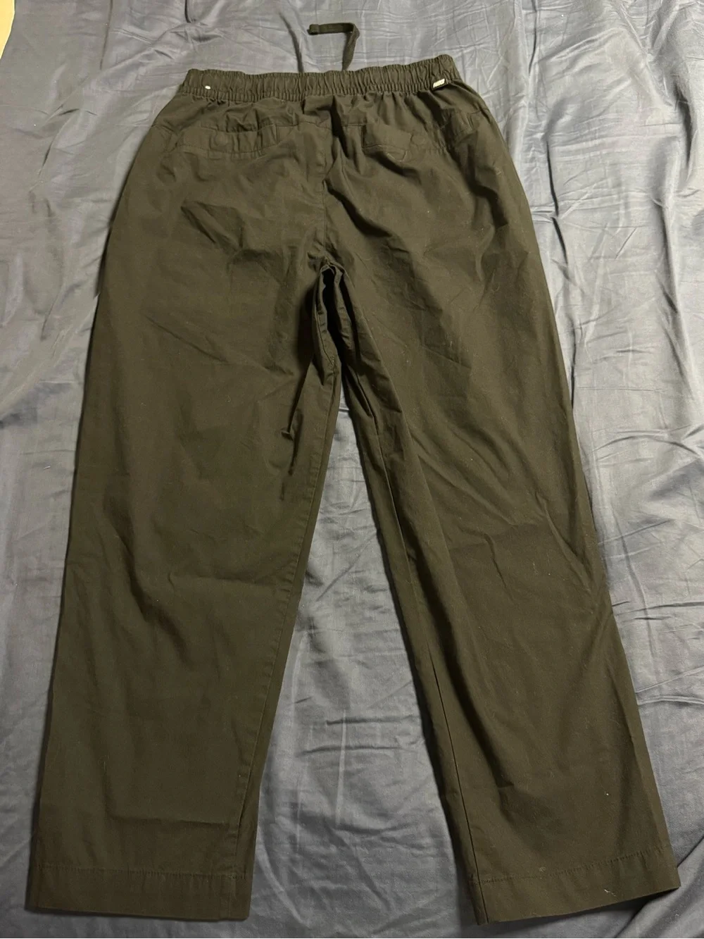 Nike Men's Black Jogger-Style Sweatpants with White Swoosh